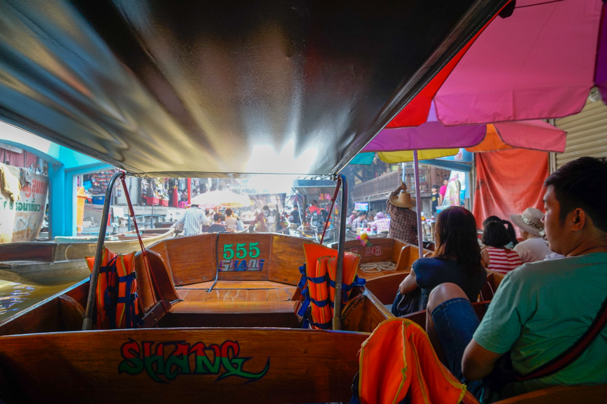 A visit to floating markets is a must in Bangkok with Kids