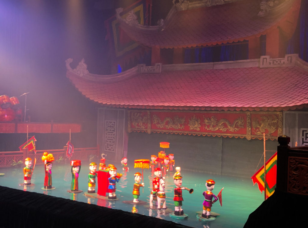 You must attend a water puppet show in Vietnam with kids