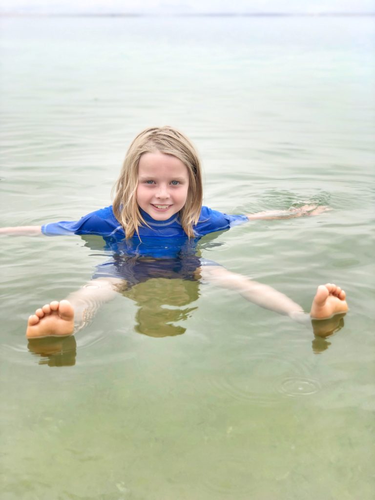 Floating in the Dead sea is a fun thing to do in Israel with kids