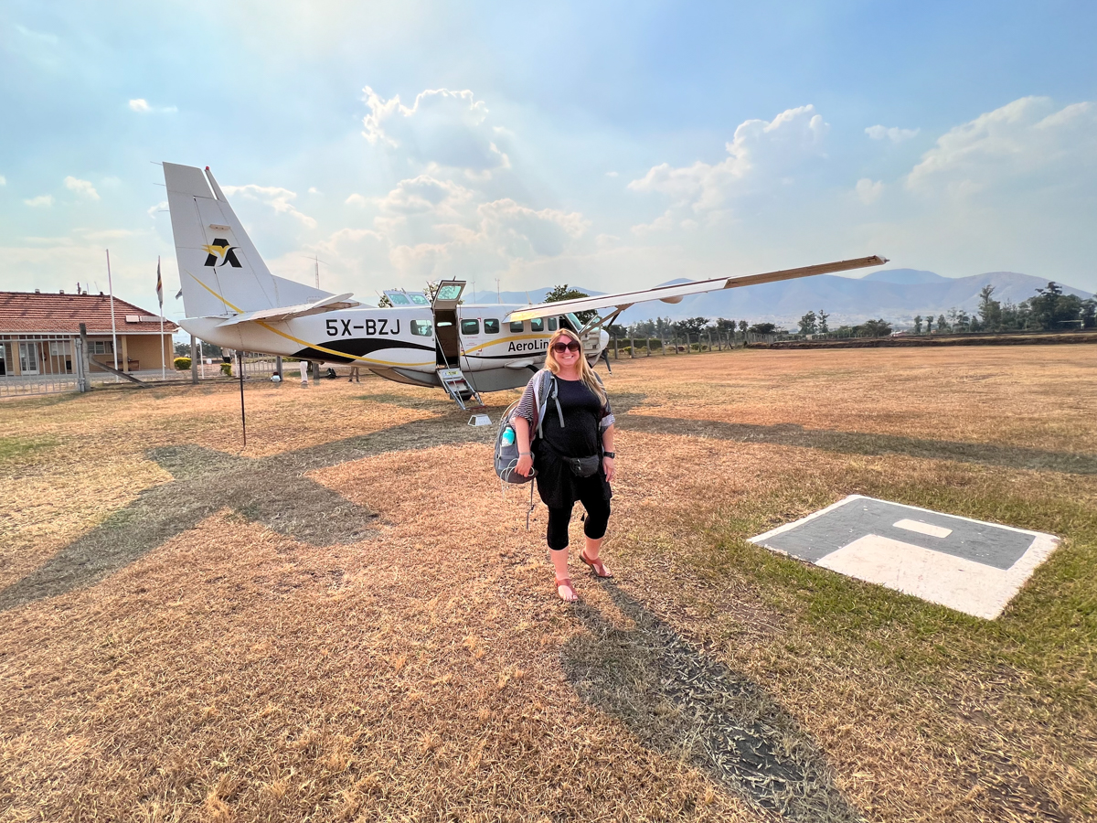 Standing in front of a bush plane in Uganda