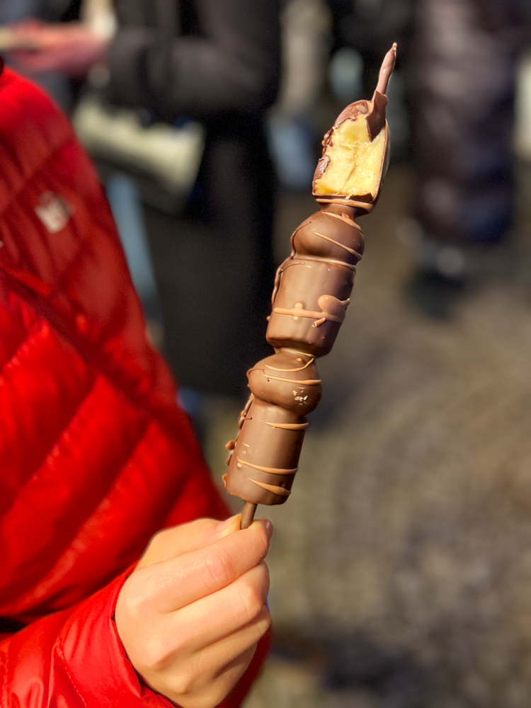 One of the greatest German Christmas Market food options are the fruit skewers covered in chocolate